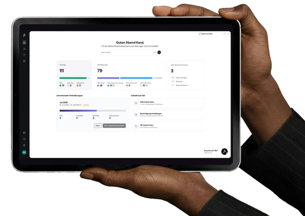 2 Hände halten ein Ipad mit einem Dashboard. Zu sehen ist die Penzilla-App.